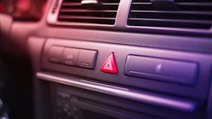 Emergency lights button inside a car