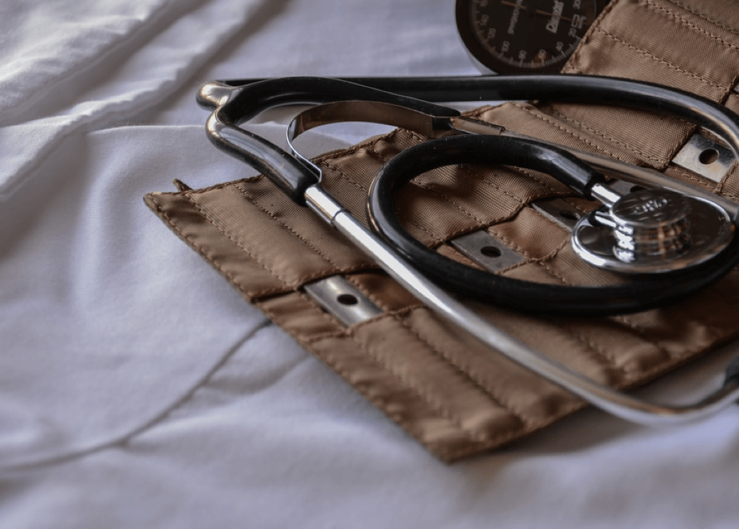 a stethoscope on a blood pressure monitor