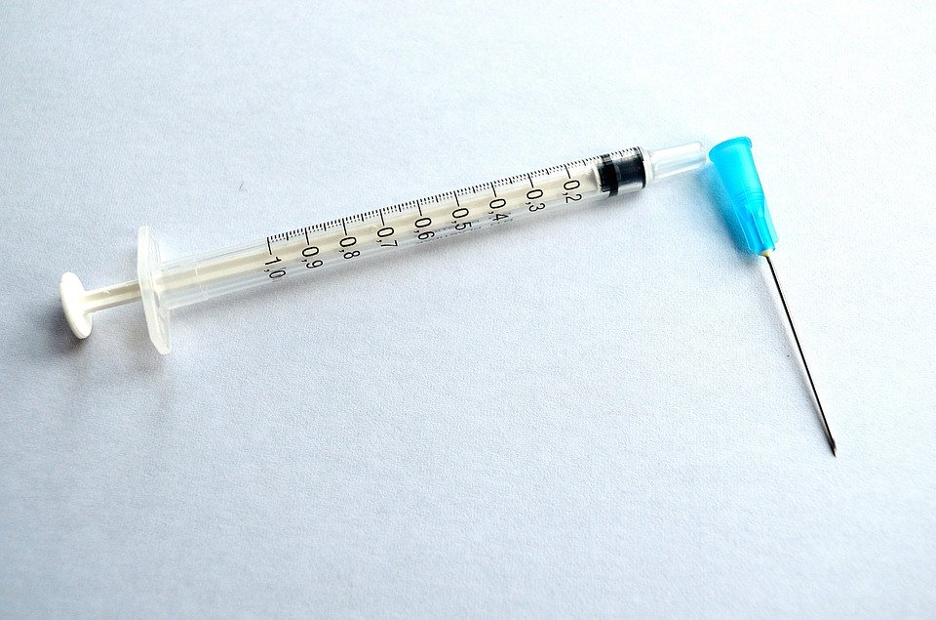 syringe and a needle