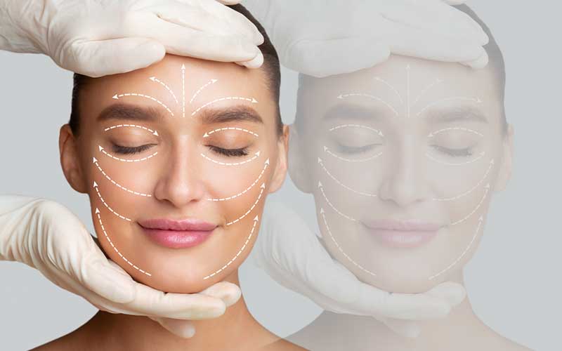 calm and smiling woman receiving a facial massage