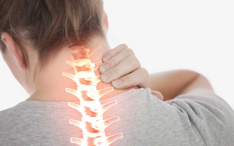 person suffering from neck pain
