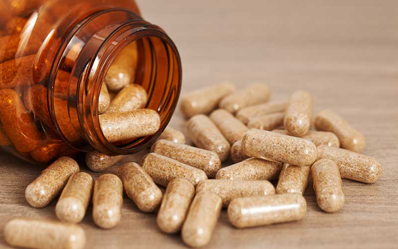 an open bottle of supplements