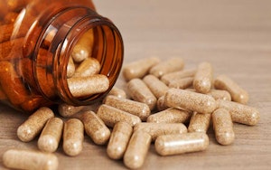an open bottle of supplements