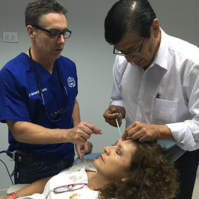 Dr. Morrissette teaching another doctor