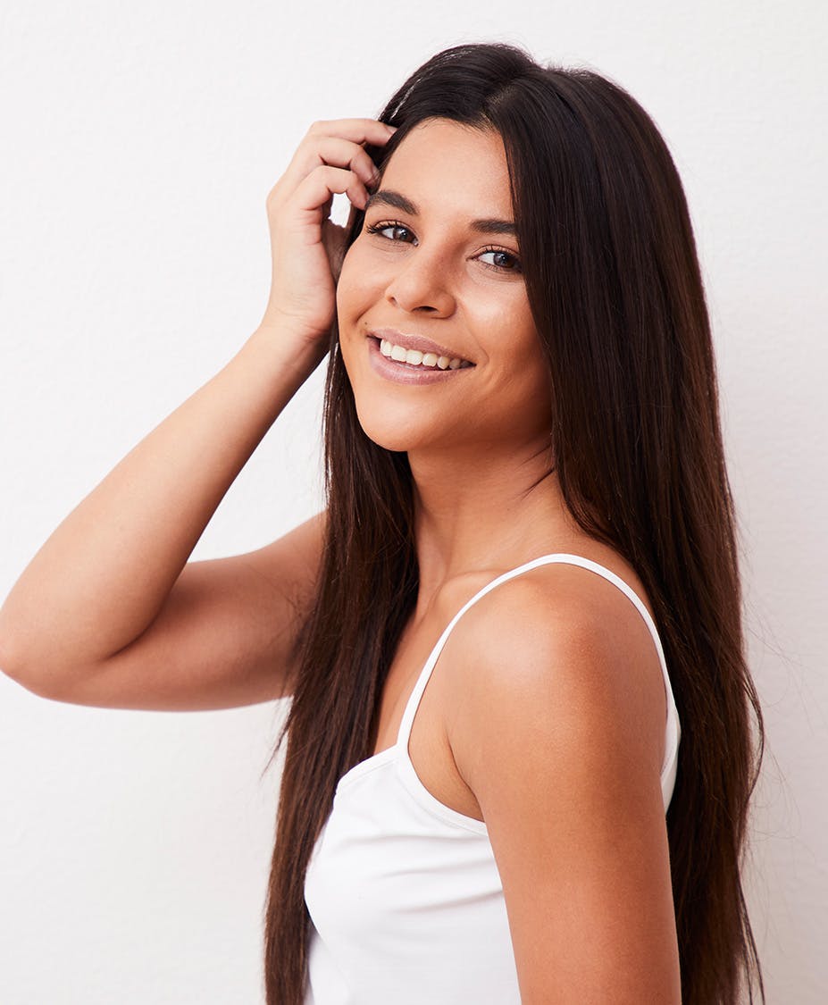 woman with her hand on hair