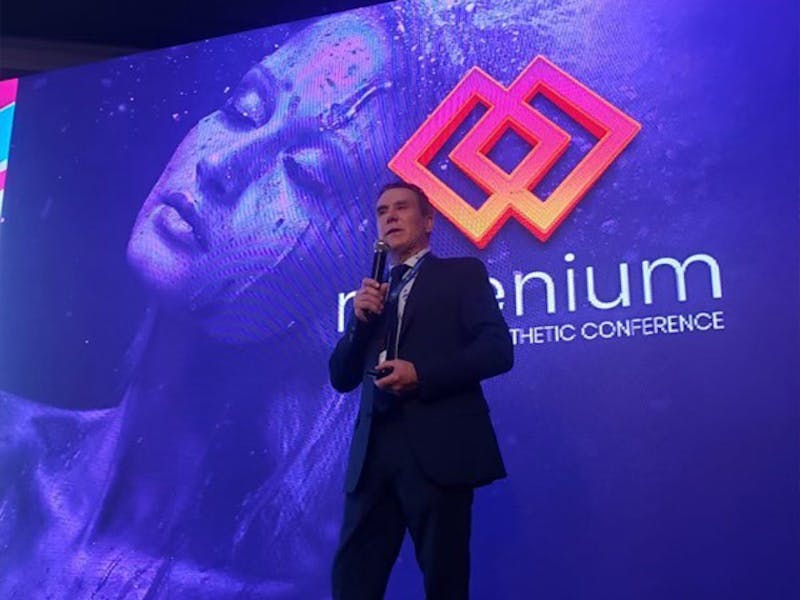Dr. Morrissette speaking on stage