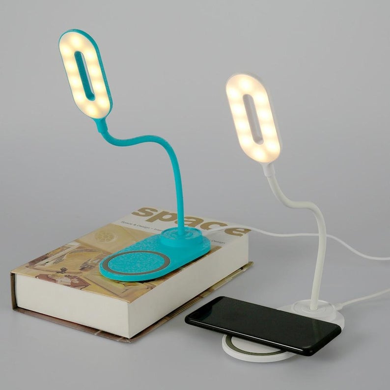Two desk lamps with wireless chargers