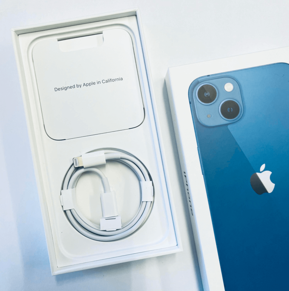 opened retail box of iphone 13 smartphone
