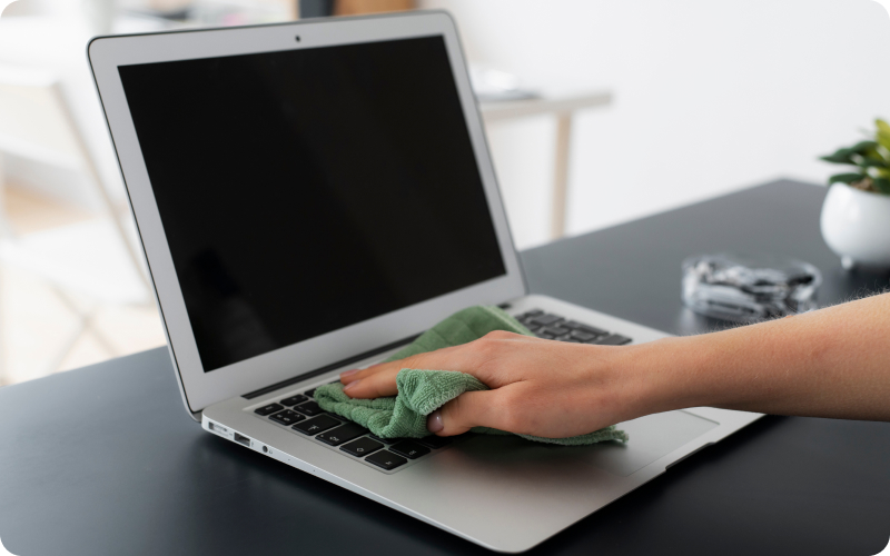 a laptop being cleaned ready for donation