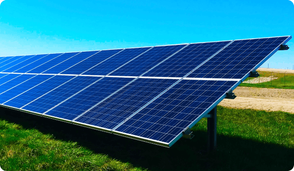 solar panels outdoors on a grass field