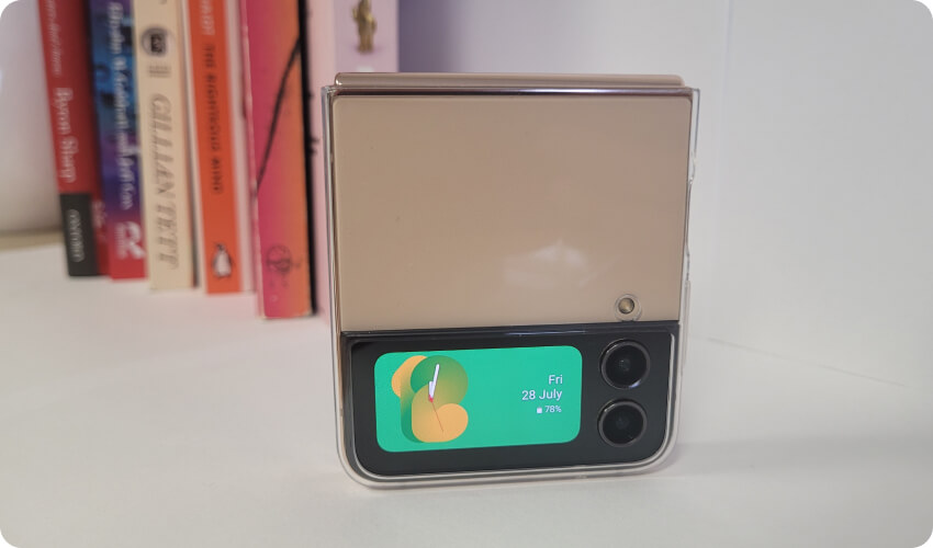 a folded mobile phone Galaxy Z Flip 4 on a shelf