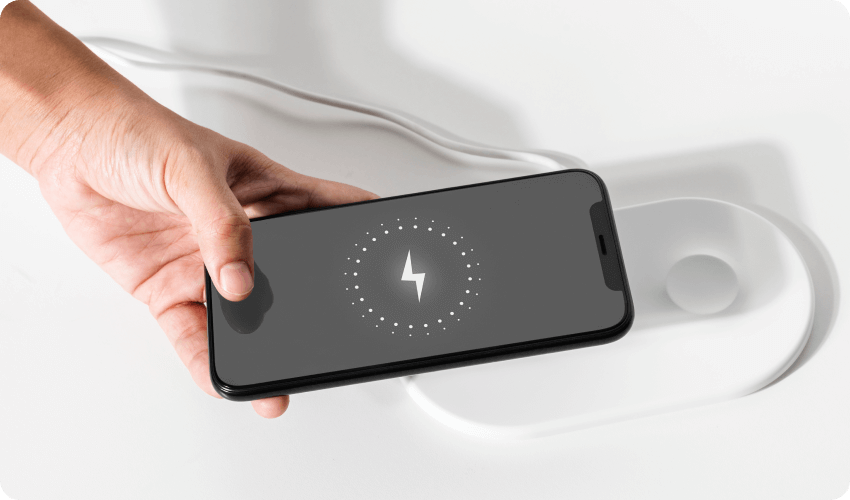 Mobile phone battery charging through a wireless charger