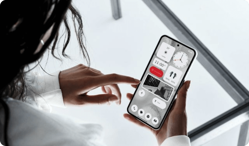 Woman Holding The Nothing Phone 2 With Screen showing Various Widgets