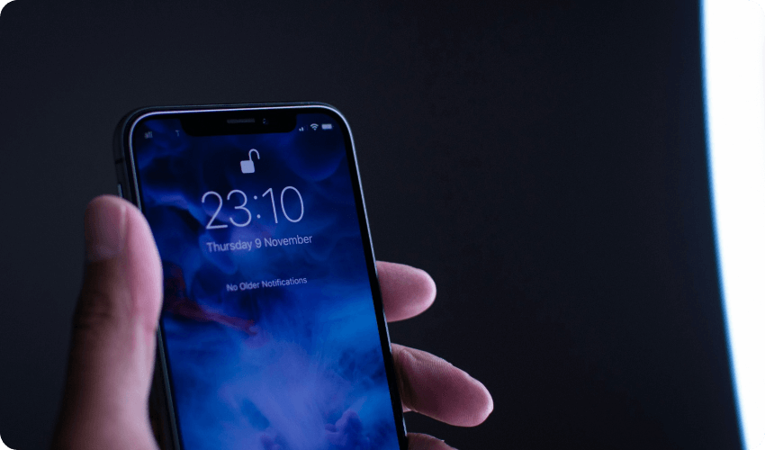 a closeup of an iphone with face id unlocked