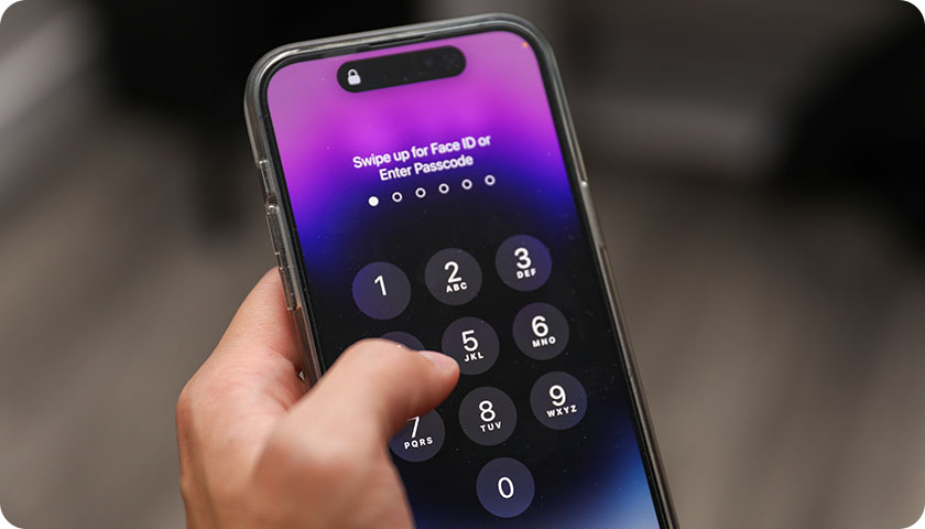 a mobile phone with enter your passcode screen on