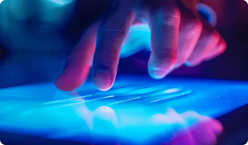 Man using the touch screen on a tablet