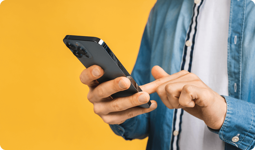 Man scrolling on an iPhone