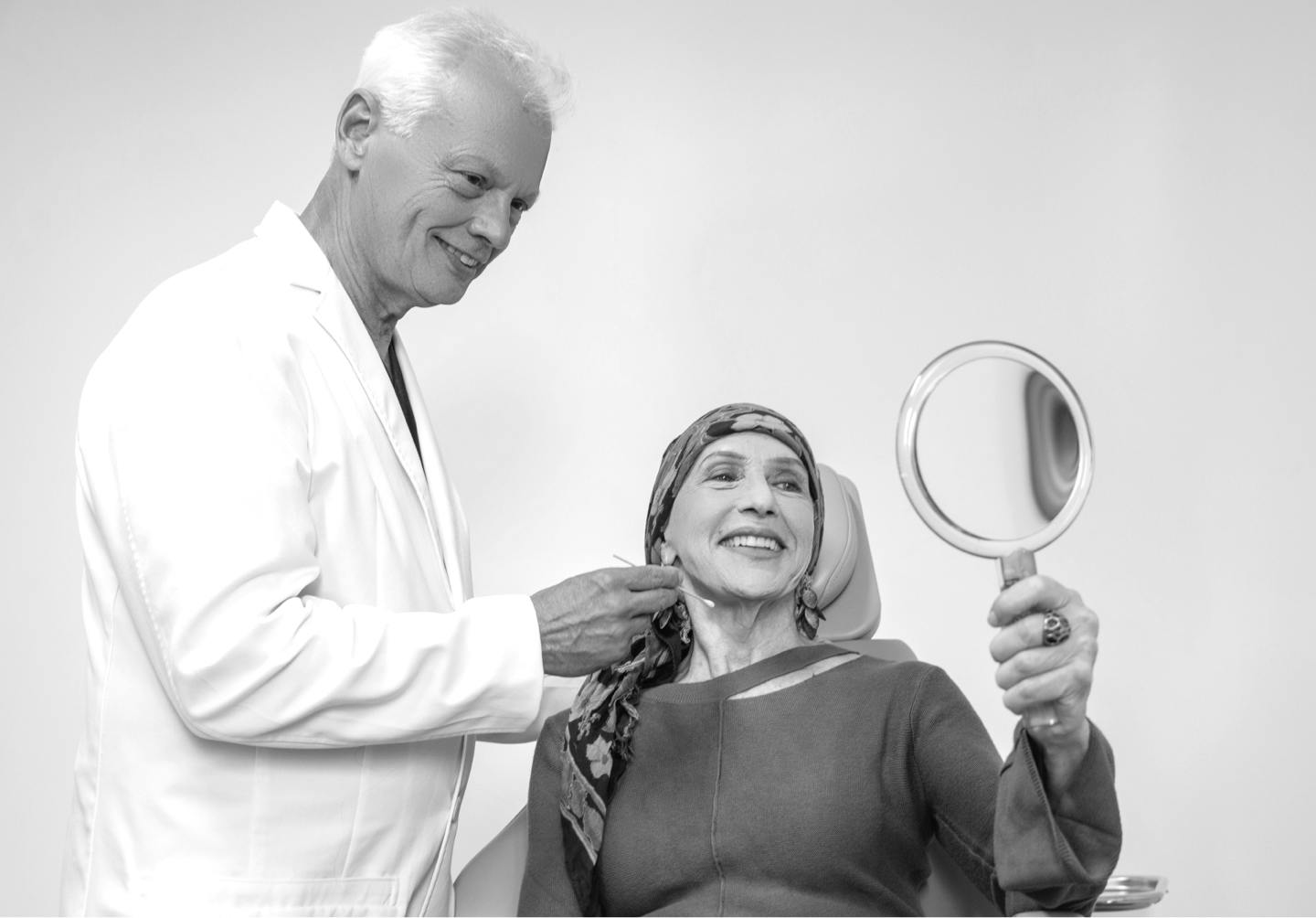 Dr. James Anthony Showing a Patient Her Results