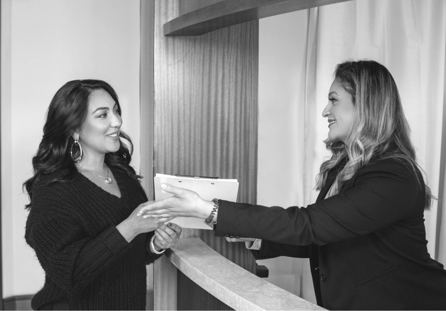 Receptionist Guiding a Patient
