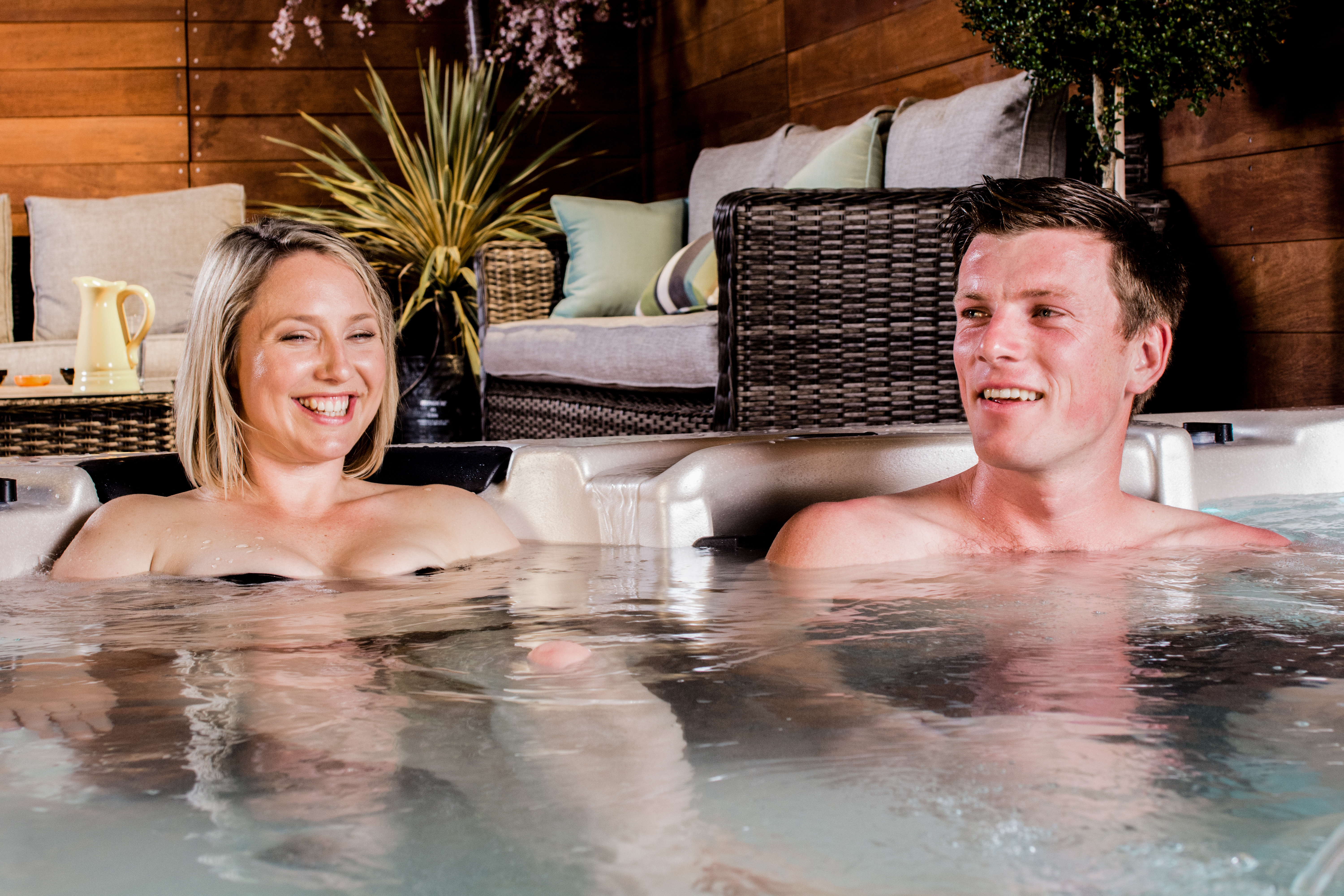 Couple on a Vortex Hydrozone swim spa