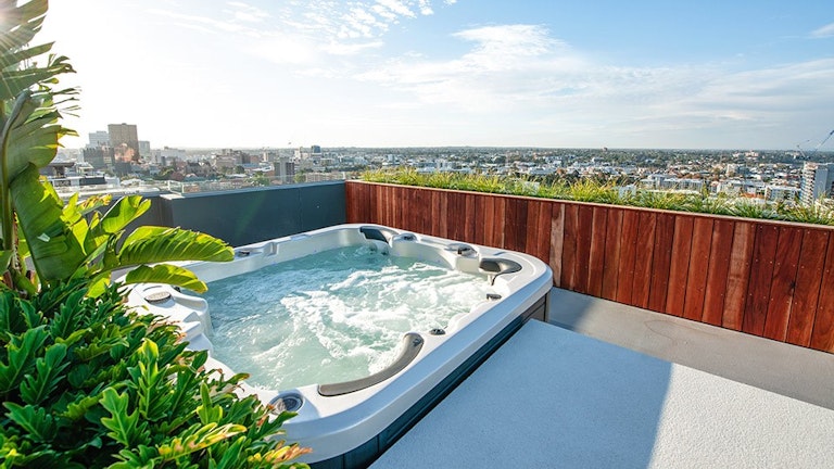 Outdoor spa on apartment balcony