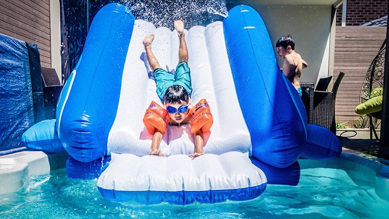 kid having fun in a swim spa