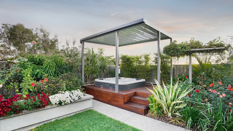 spa in garden with pergola