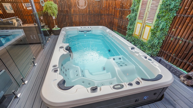 semi in-ground spa in a deck