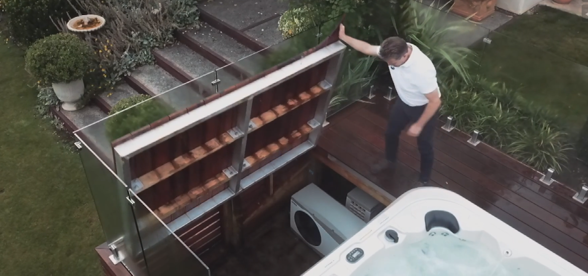 Pool heat pump in a deck