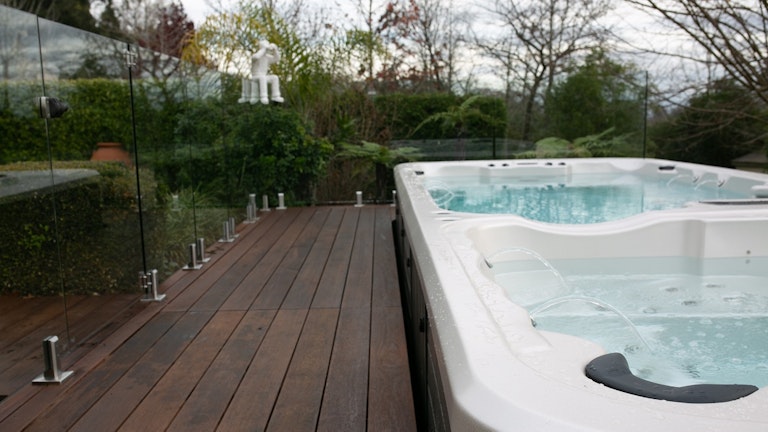 In-ground pool in a timber deck