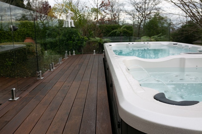 In-ground pool in a timber deck