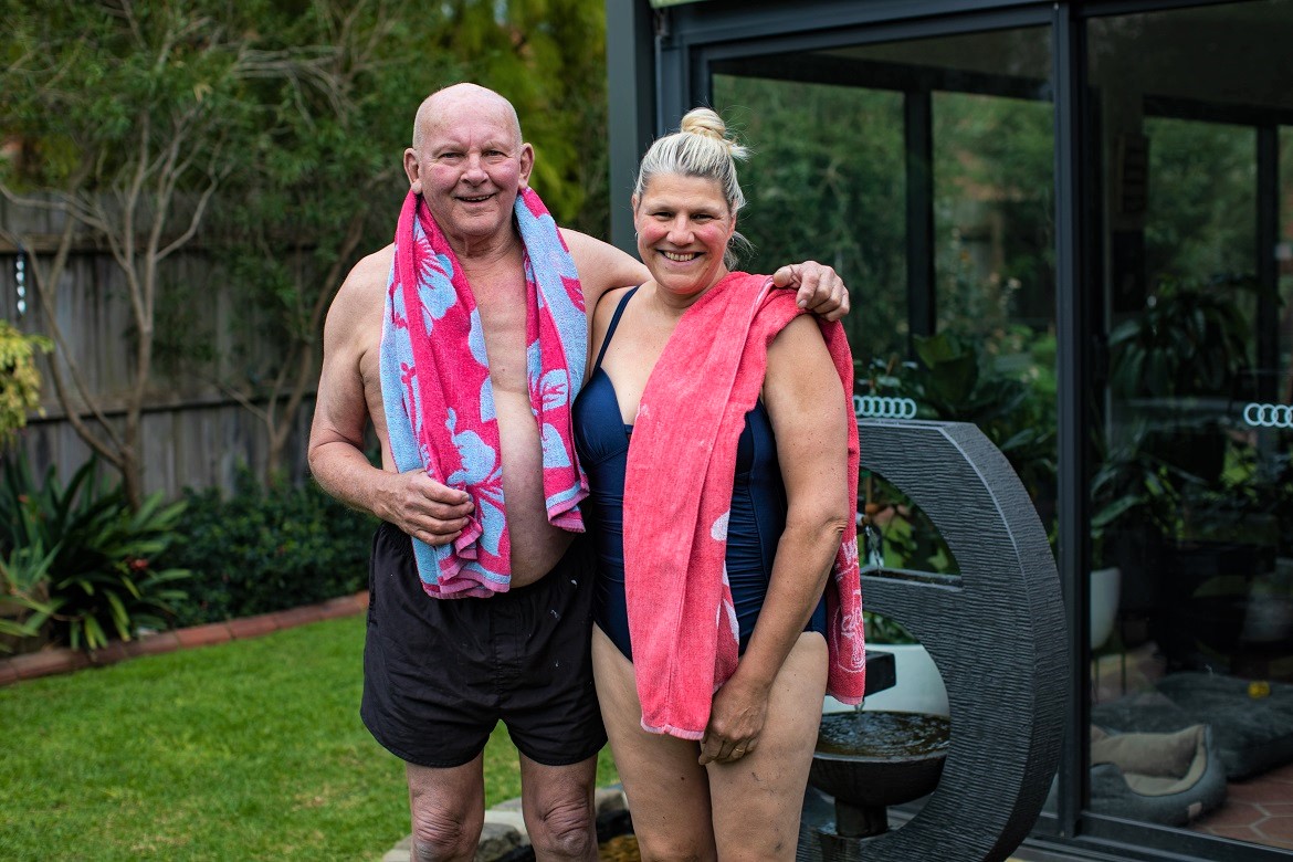 Happy couple going for a swim