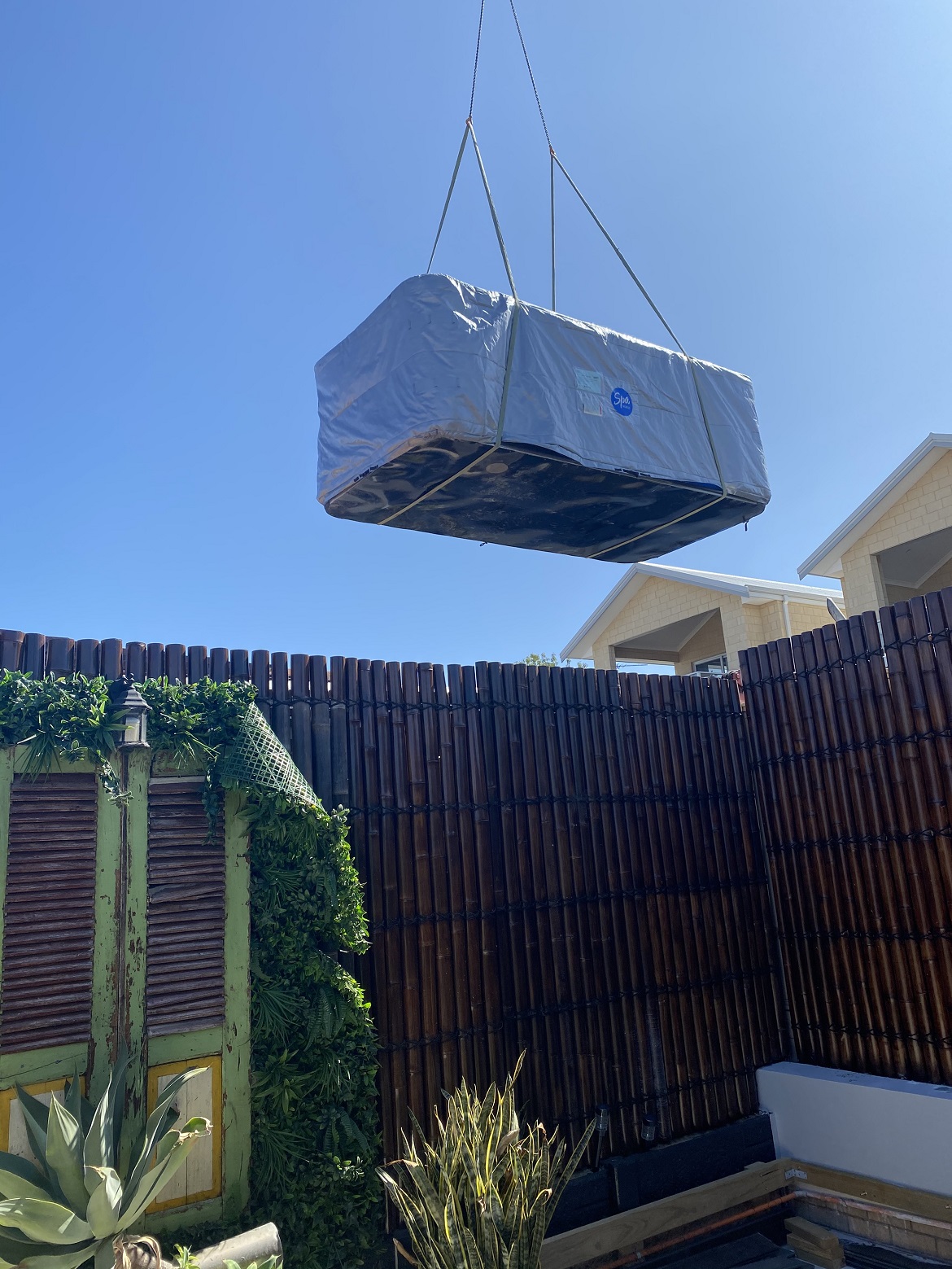Swim spa delivery by crane