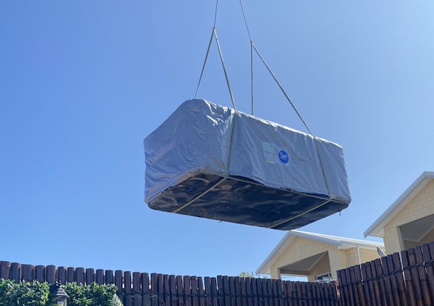 Swim spa delivery by crane