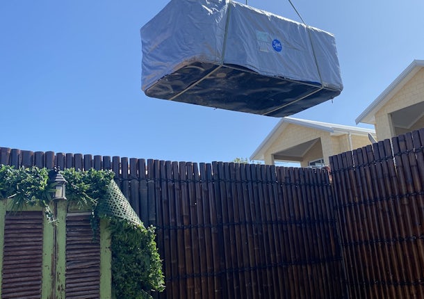 Swim spa delivery by crane