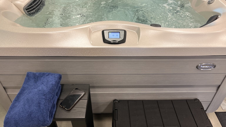 Smartphone near spa pool
