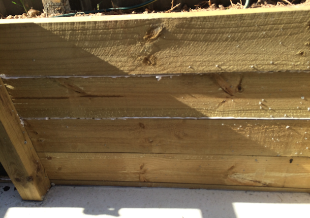 Timber retaining wall swim spa