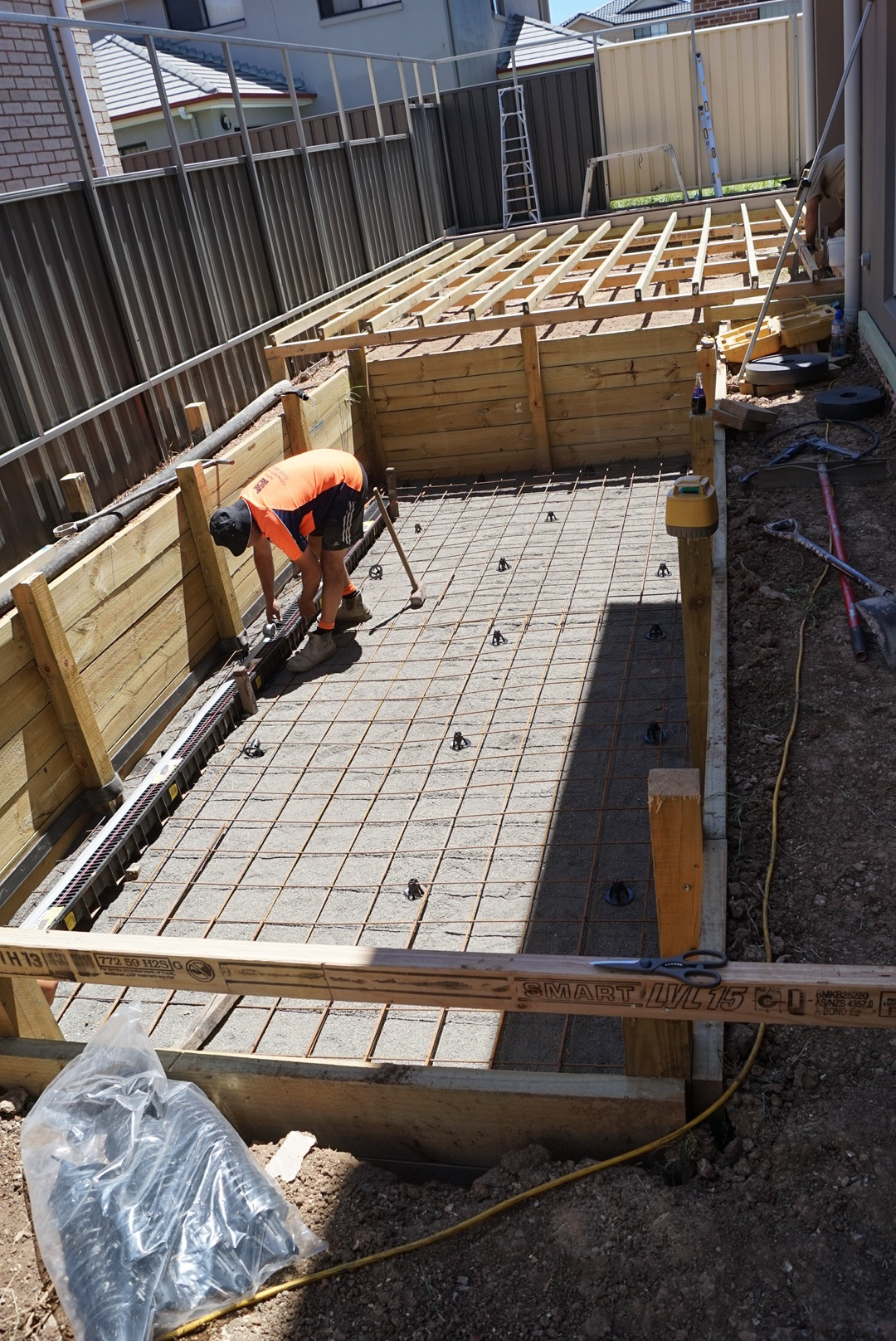 Concrete base for in-ground swim spa pit