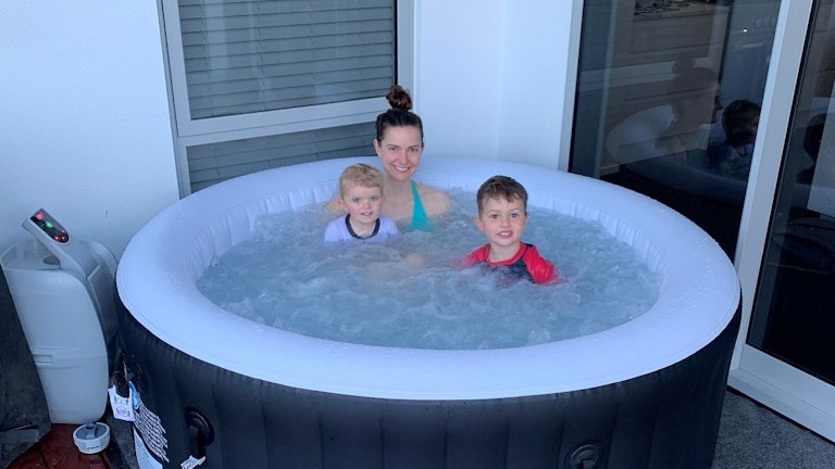 mother and kids in an inflatable spa