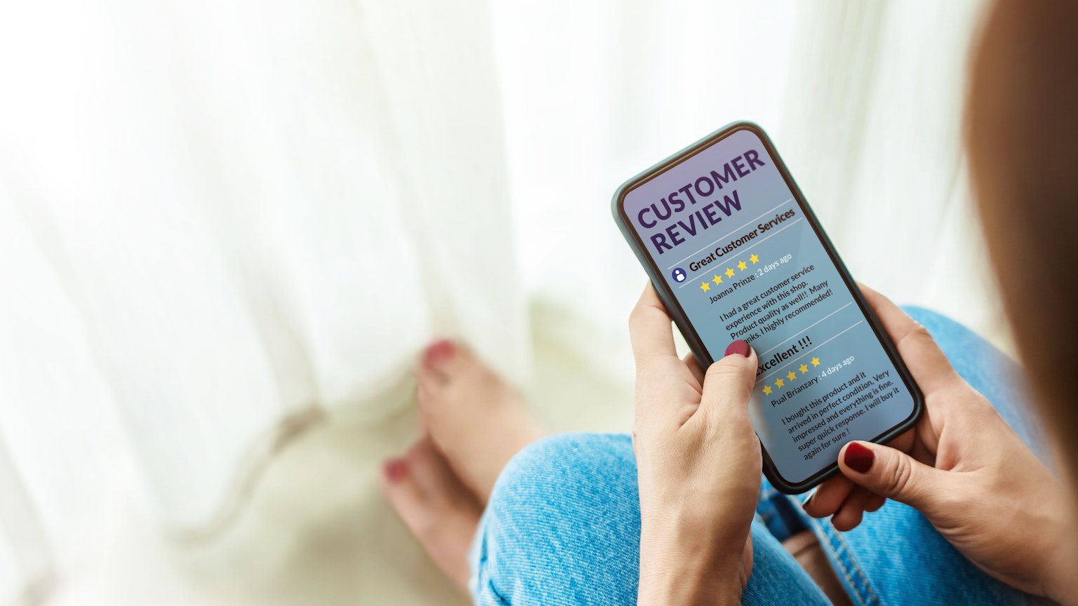 Customer reading reviews online