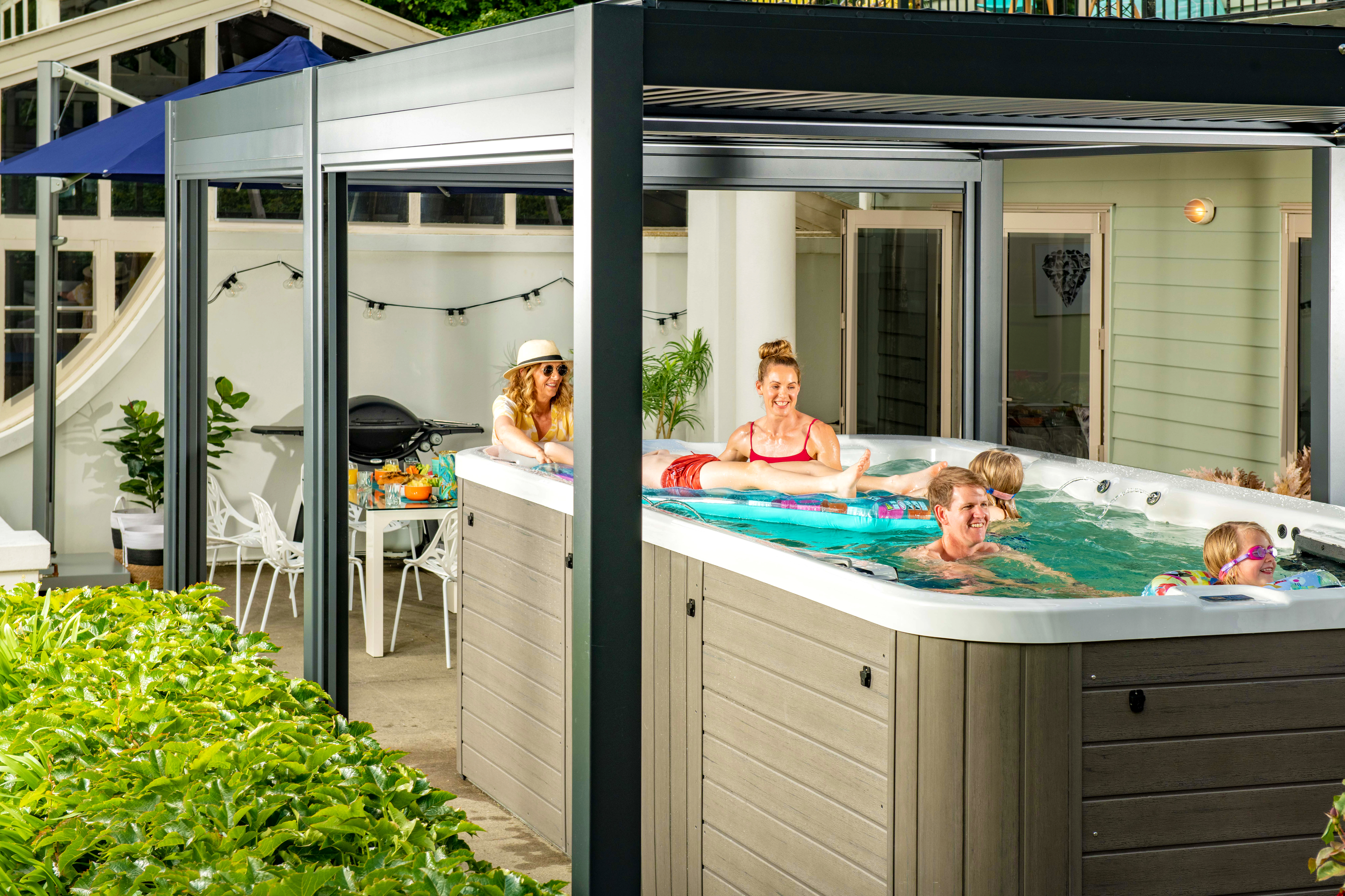 family in a swim spa