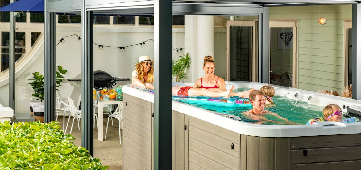 family in a swim spa