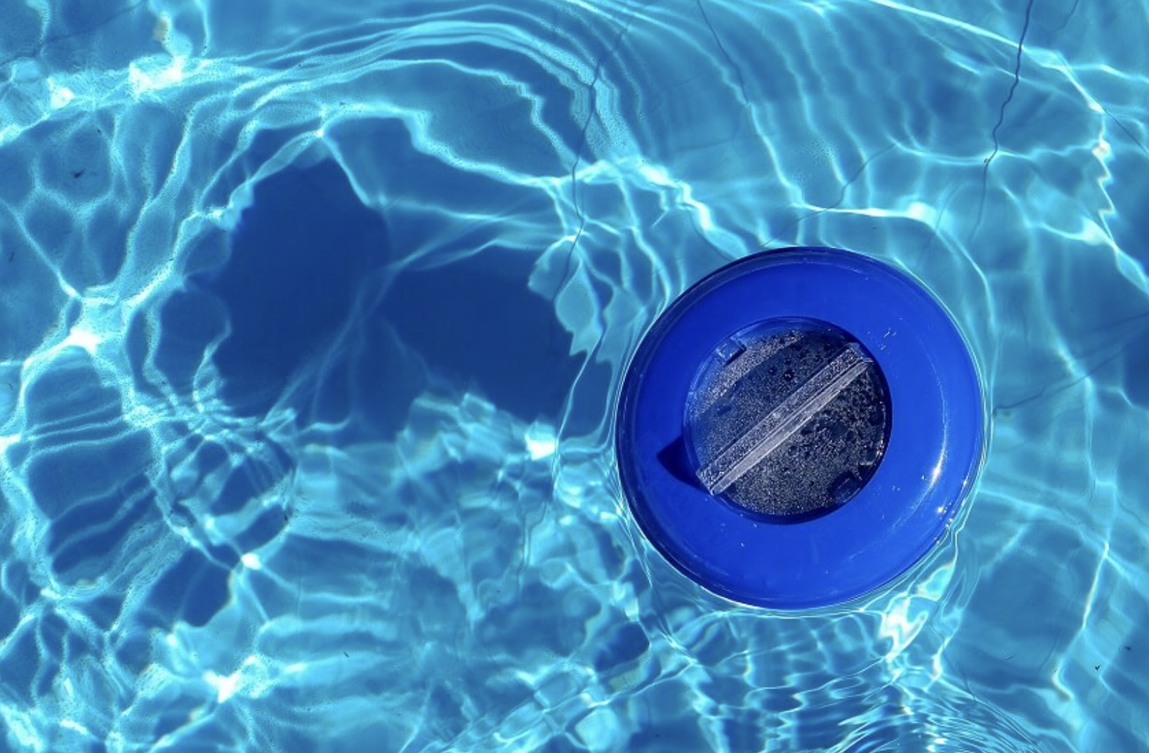 bromine tablet in a floating dispenser