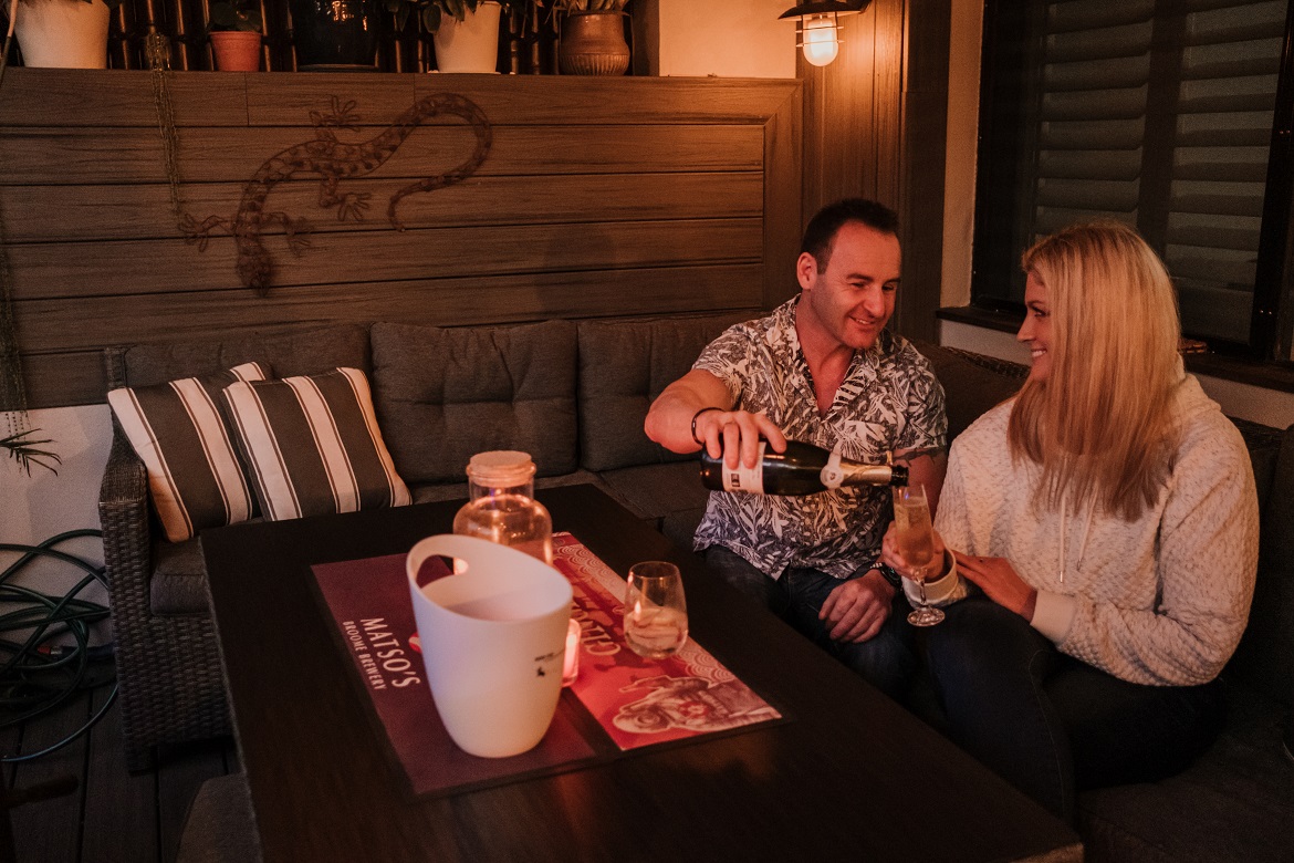 Sitting outside and relaxing couple