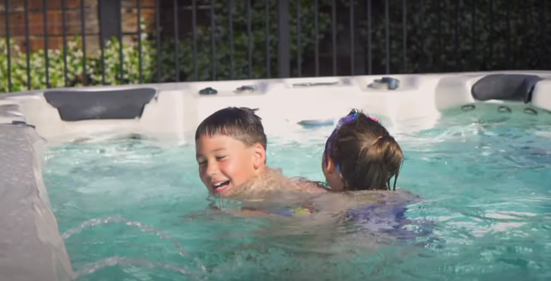 Kids comfortable in a swim spa