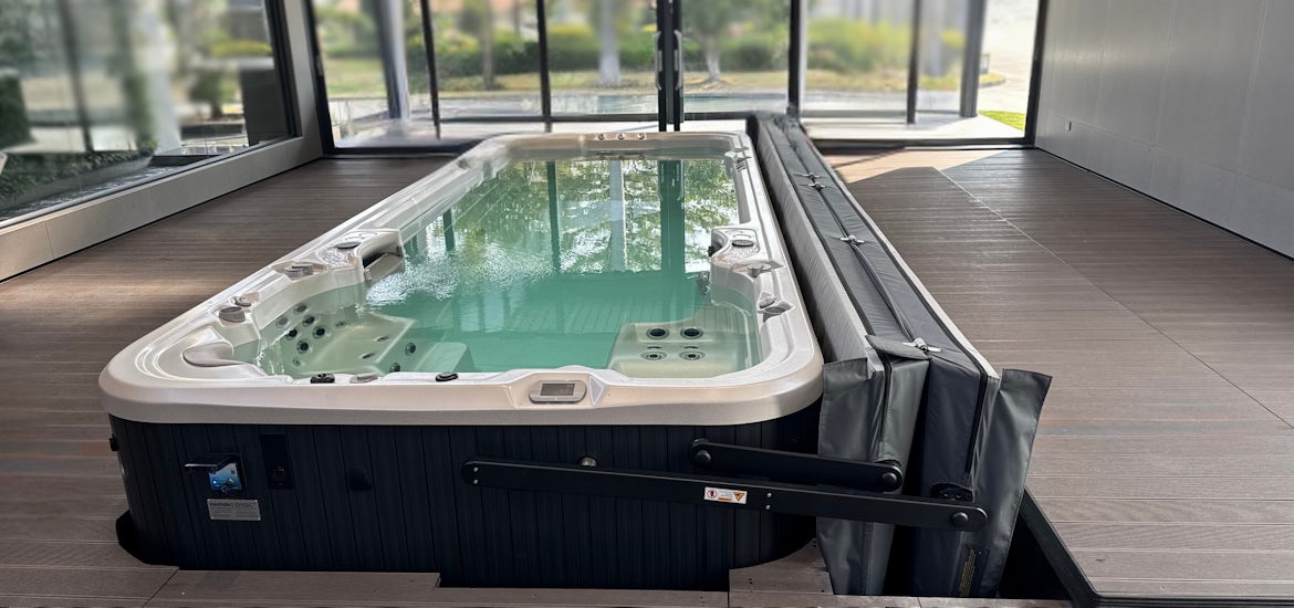 Swim spa on a deck with ClearLift automatic cover
