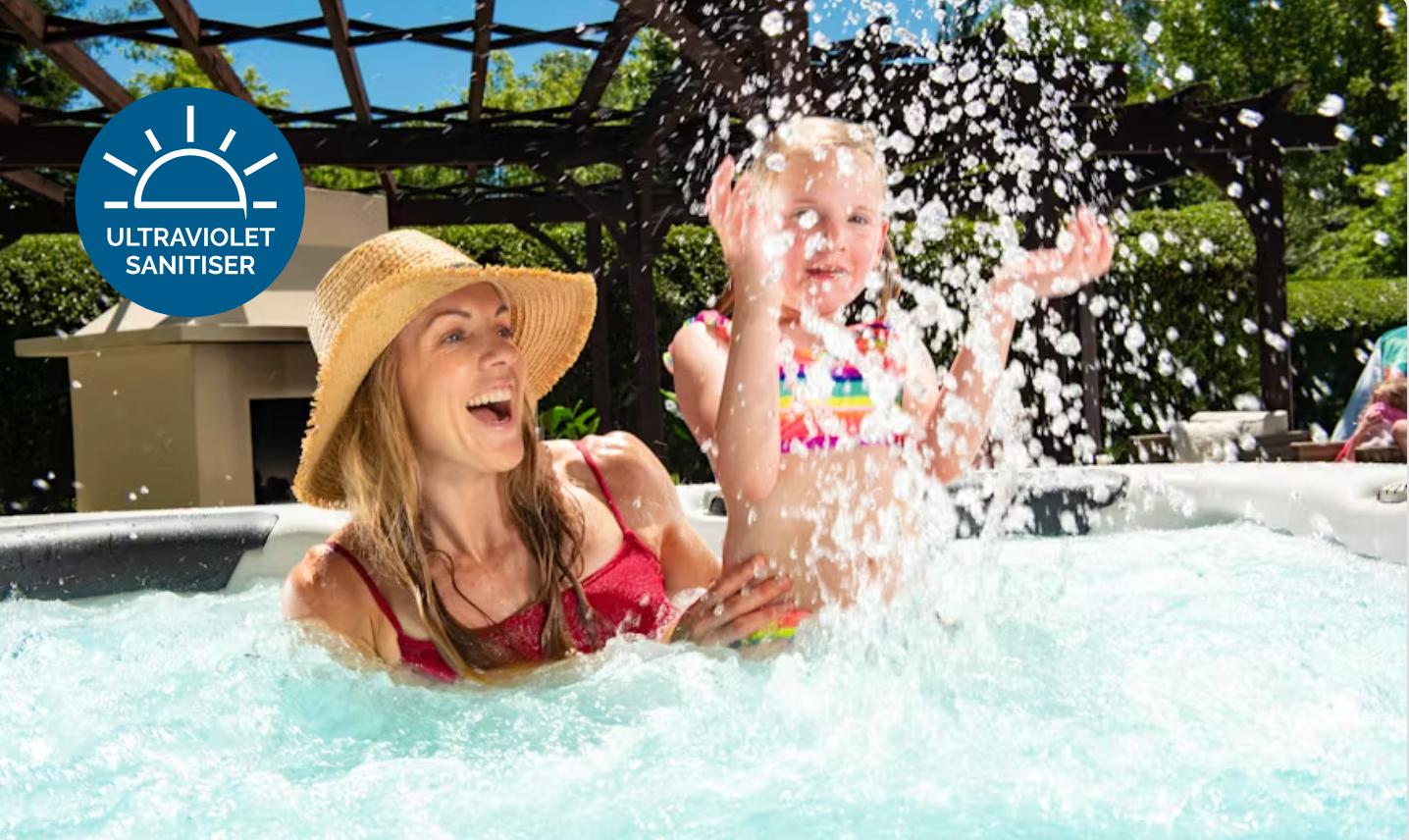 Mother and child enjoying quality time in a spa with UV sanitiser ensuring clean and safe water.