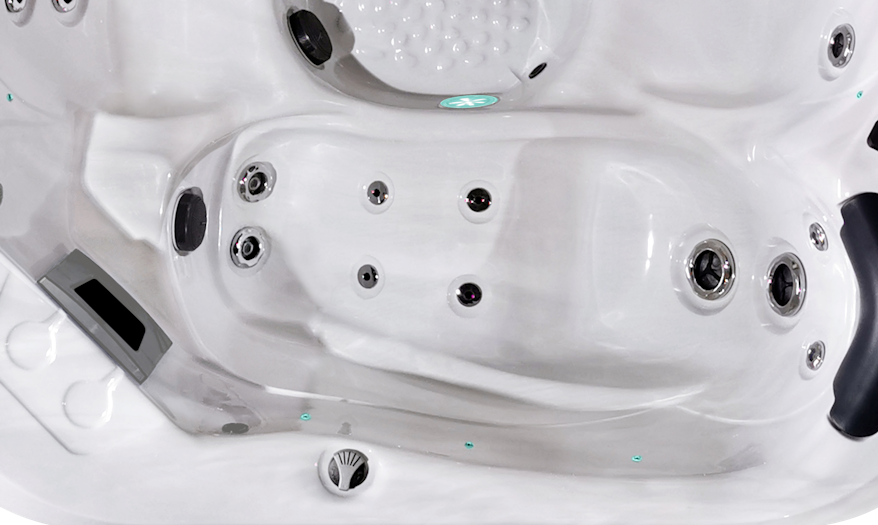 Overhead view of the Fisher 5S Spa, highlighting its ergonomic lounger, spacious layout, advanced hydrotherapy jet configuration, and foot massager