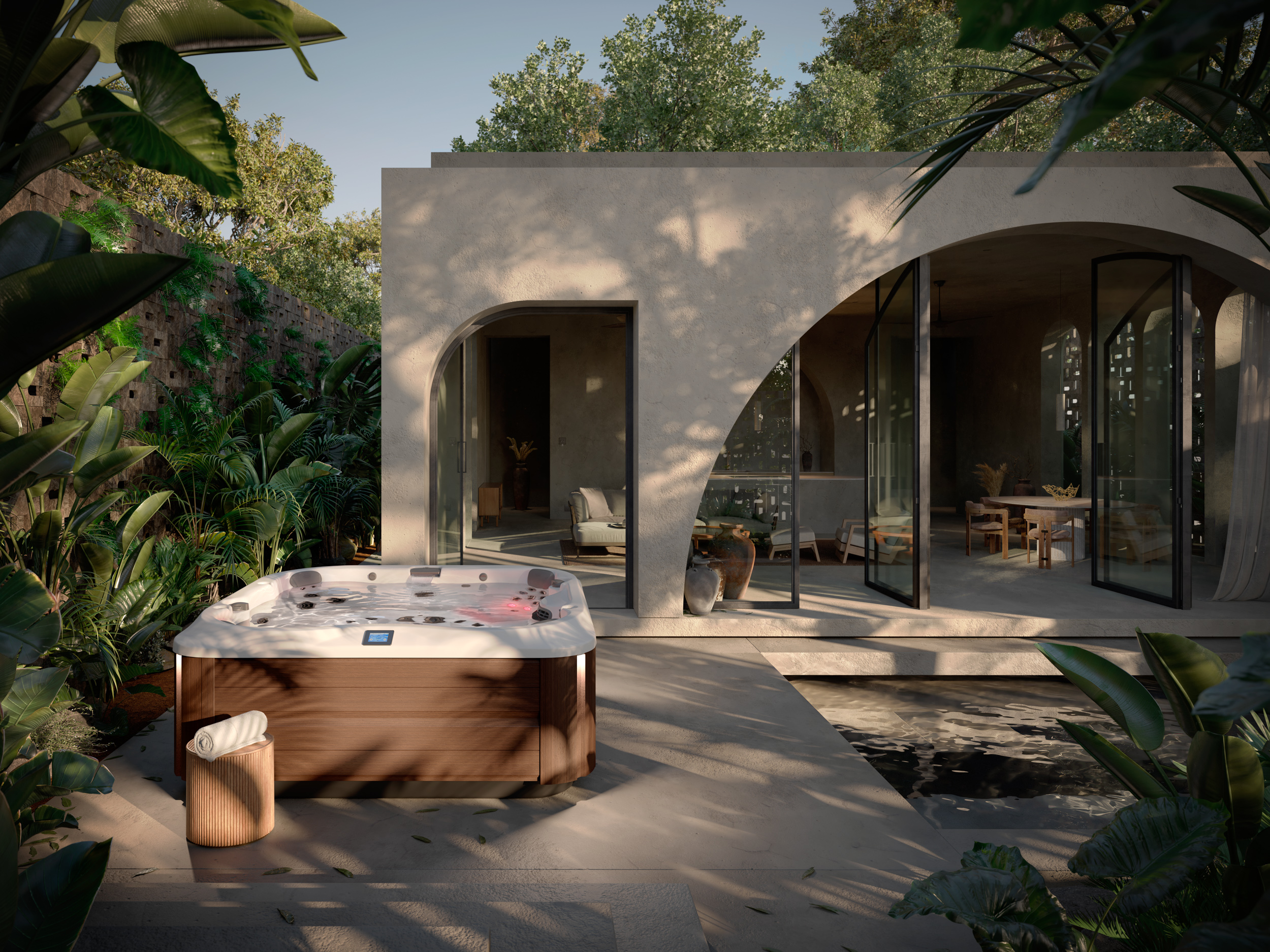 Jacuzzi® J-365™ in a villa's backyard