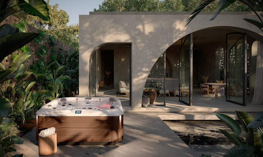 Jacuzzi® J-365™ in a villa's backyard